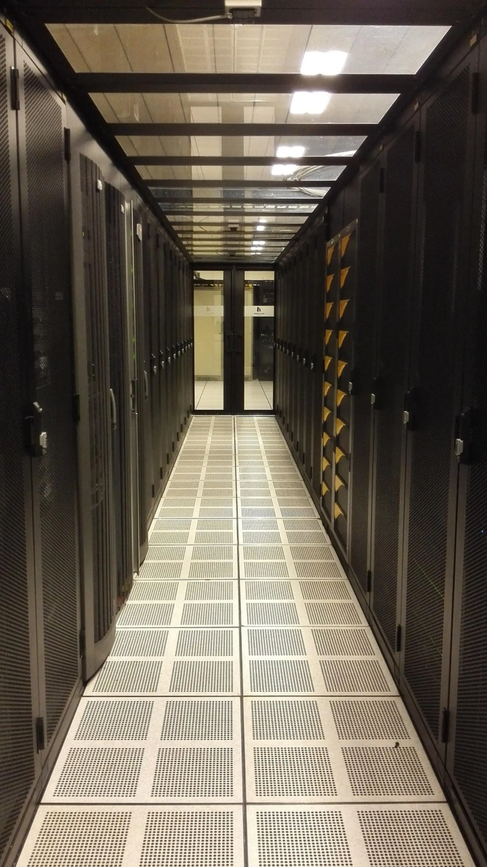 A quiet corporate data center aisle