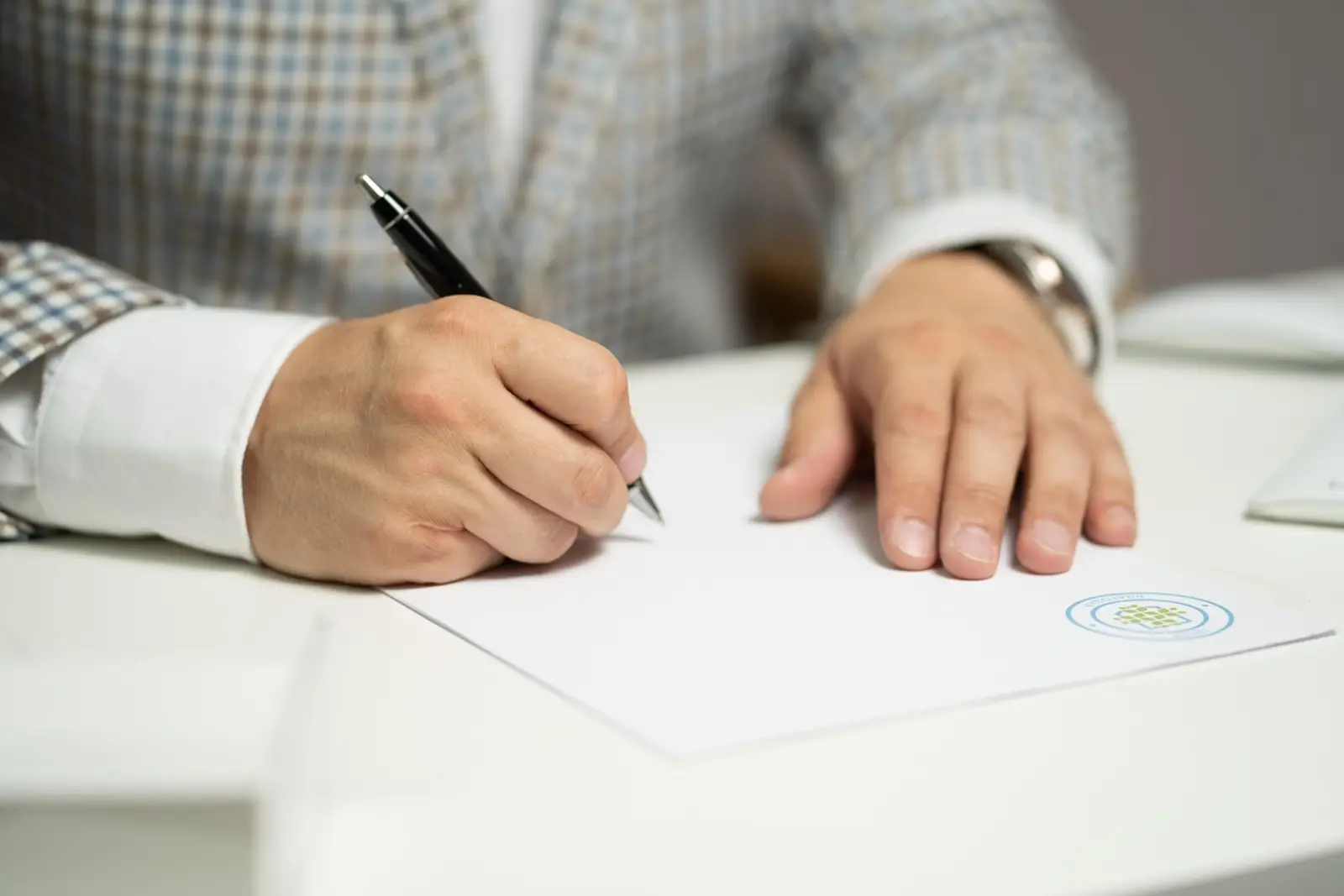 Executives signing an agreement